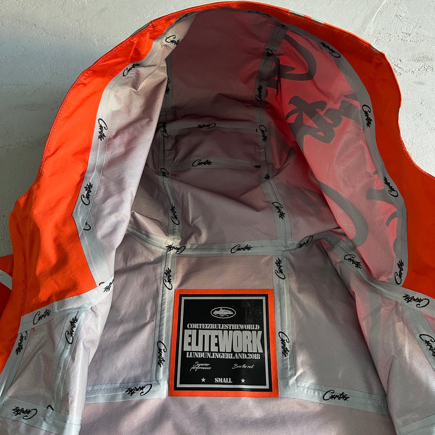 Corteiz Elitework Waterproof Shell Jacket Orange